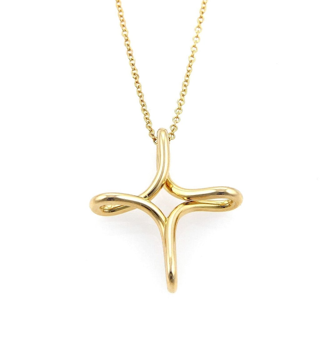 Tiffany & Co Elsa Peretti Infinity 18k Gold Cross Necklace: Tiffany & Co Elsa Peretti Infinity 18k Gold Cross Necklace Pre-owned Tiffany & Co. Elsa Peretti Infinity cross pendant necklace in 18k yellow gold. This signed necklace features a sculptural Infinity-