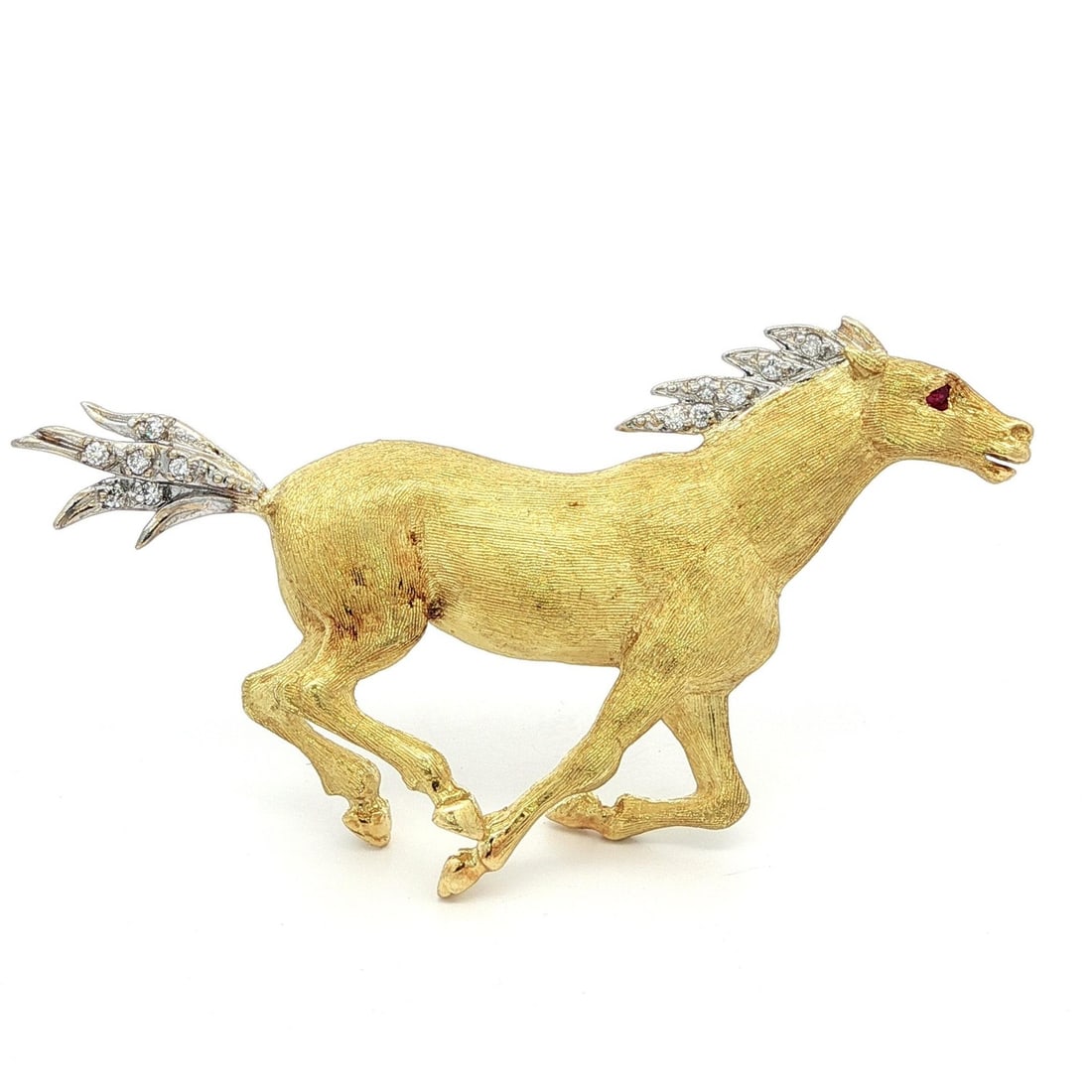 Vintage 18k Gold Diamond Ruby Eye Horse Brooch Pave Set: Vintage 18k Gold Diamond Ruby Eye Horse Brooch Pave Set This exquisite vintage brooch features a galloping horse design, crafted from solid 18k yellow gold accented with 14k white gold for the tail an