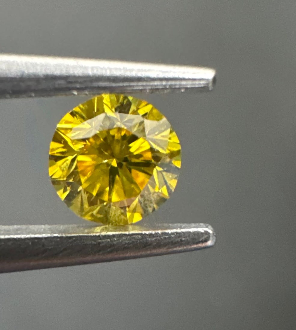Loose Diamond - ROUND 0.19ct Fancy Vivid Yellow SI1: Loose Diamond - ROUND 0.19ct Fancy Vivid Yellow SI1 Source: Natural Shape: ROUND Carats: 0.19 Color: Fancy Vivid Yellow Certification: GIA PLEASE NOTE: Framed, Large, or heavy items do not have shippi