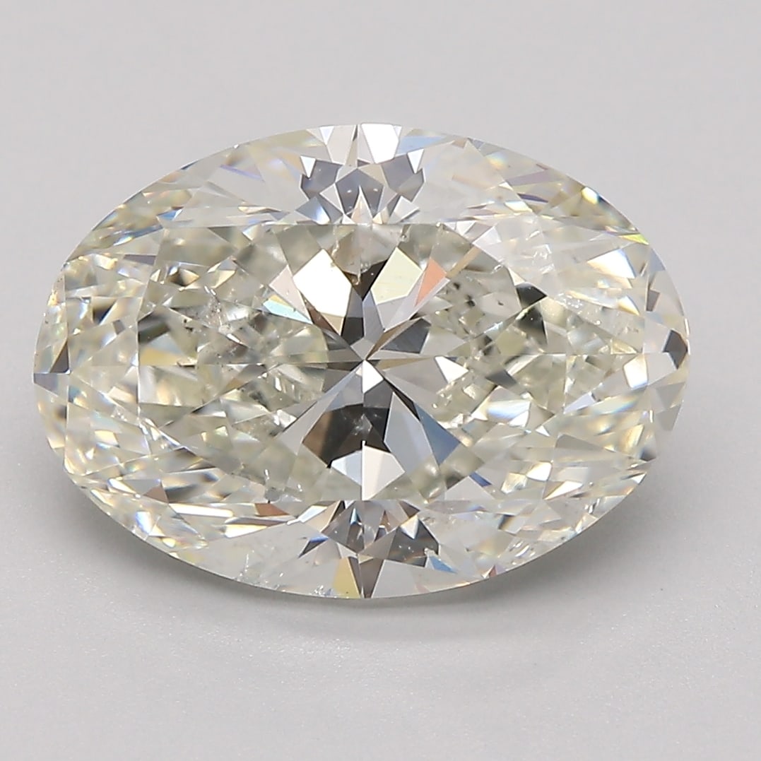 Loose Diamond - OVAL 5.01ct J SI2: Loose Diamond - OVAL 5.01ct J SI2 Source: Natural Mined Diamond Shape: OVAL Carats: 5.01 Color: J Clarity: SI2 Certification: GIA Condition: Pre-Owned PLEASE NOTE: Framed, Large, or heavy items do not
