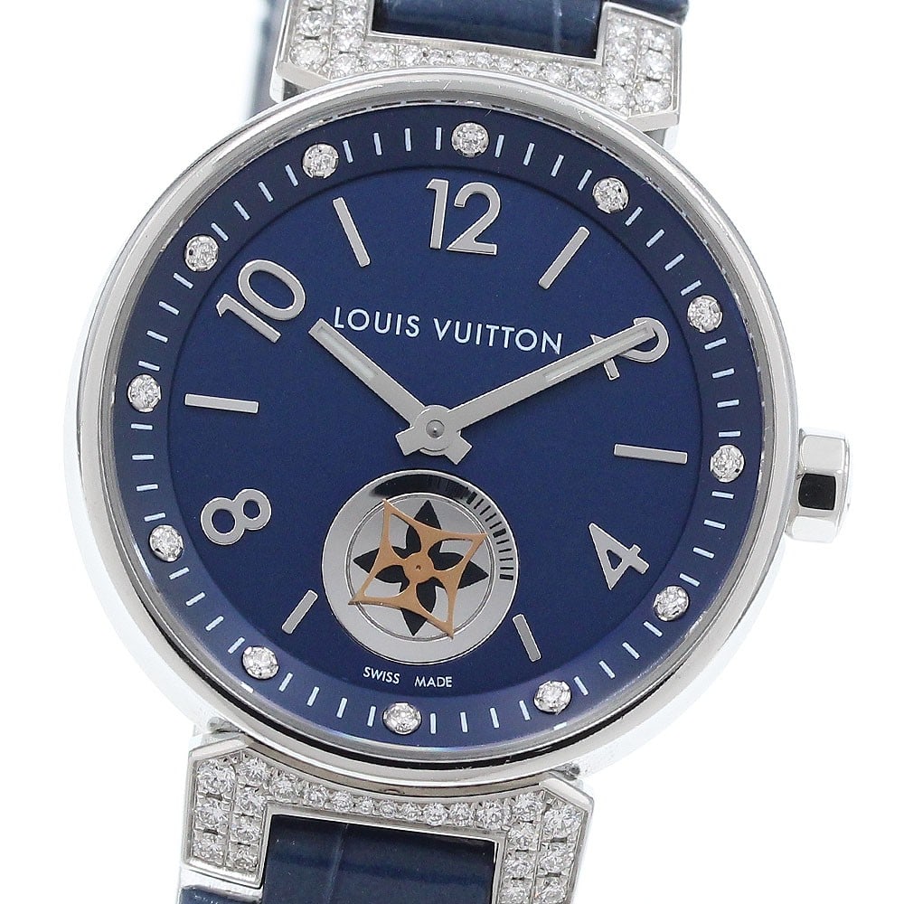 Louis Vuitton Tambour QA033 Womens Quartz Diamond Wristwatch: Louis Vuitton Tambour QA033 Womens Quartz Diamond Wristwatch Pre-owned Louis Vuitton Tambour women's wristwatch with a navy dial, quartz movement, and 12P diamond design. This Swiss-made watch feature