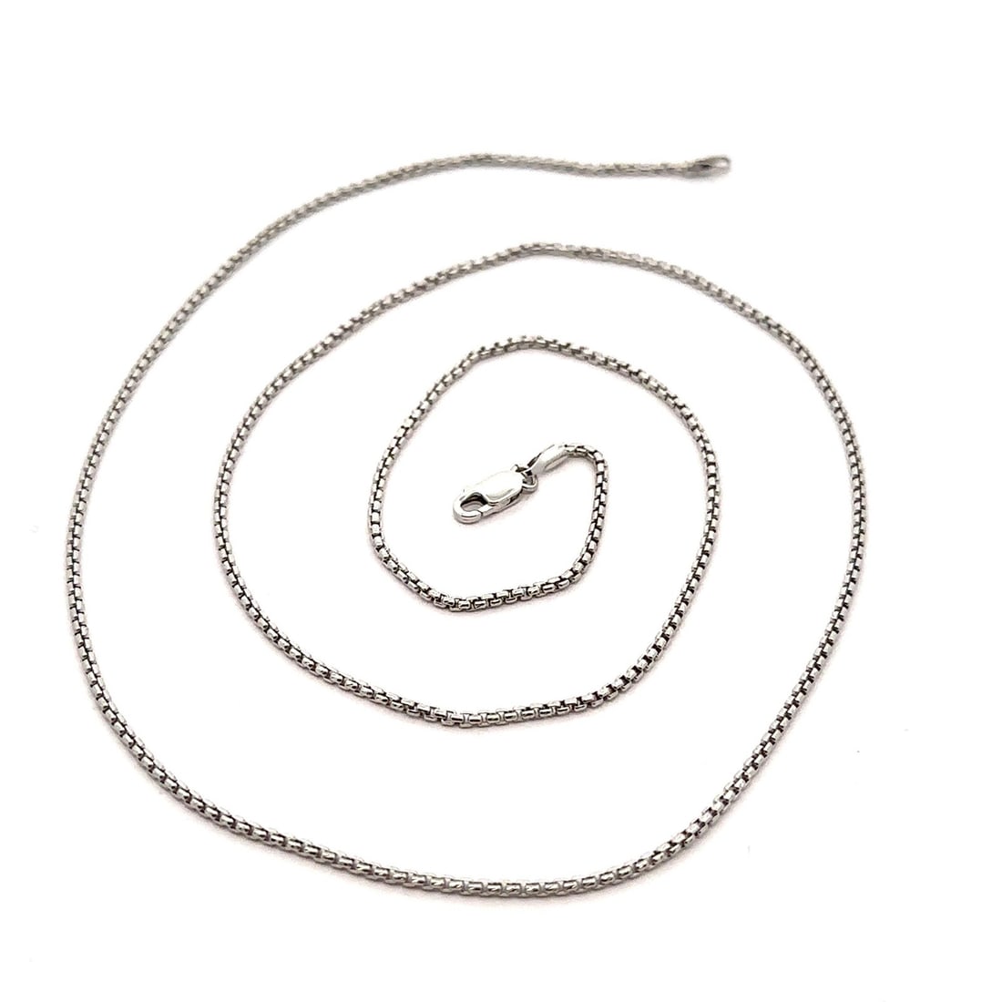 22 Inch 1.2mm 14k White Gold Beveled Box Chain Necklace Unisex: 22 Inch 1.2mm 14k White Gold Beveled Box Chain Necklace Unisex This un-used chain necklace features a 22-inch beveled box link design crafted from solid 14k white gold. The chain has a thickness of ap