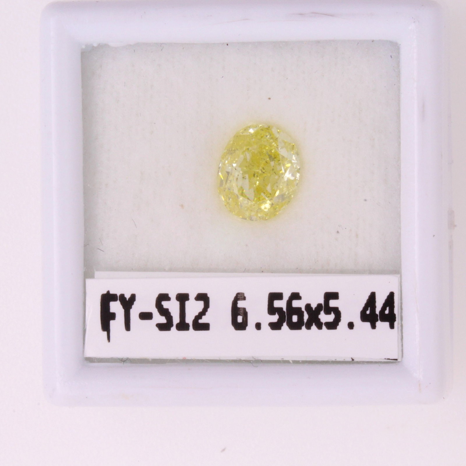 Loose Diamond - OVAL 1.06ct Fancy Yellow SI2: Loose Diamond - OVAL 1.06ct Fancy Yellow SI2 Source: Natural Shape: OVAL Carats: 1.06 Color: Fancy Yellow Certification: GIA PLEASE NOTE: Framed, Large, or heavy items do not have shipping costs inclu