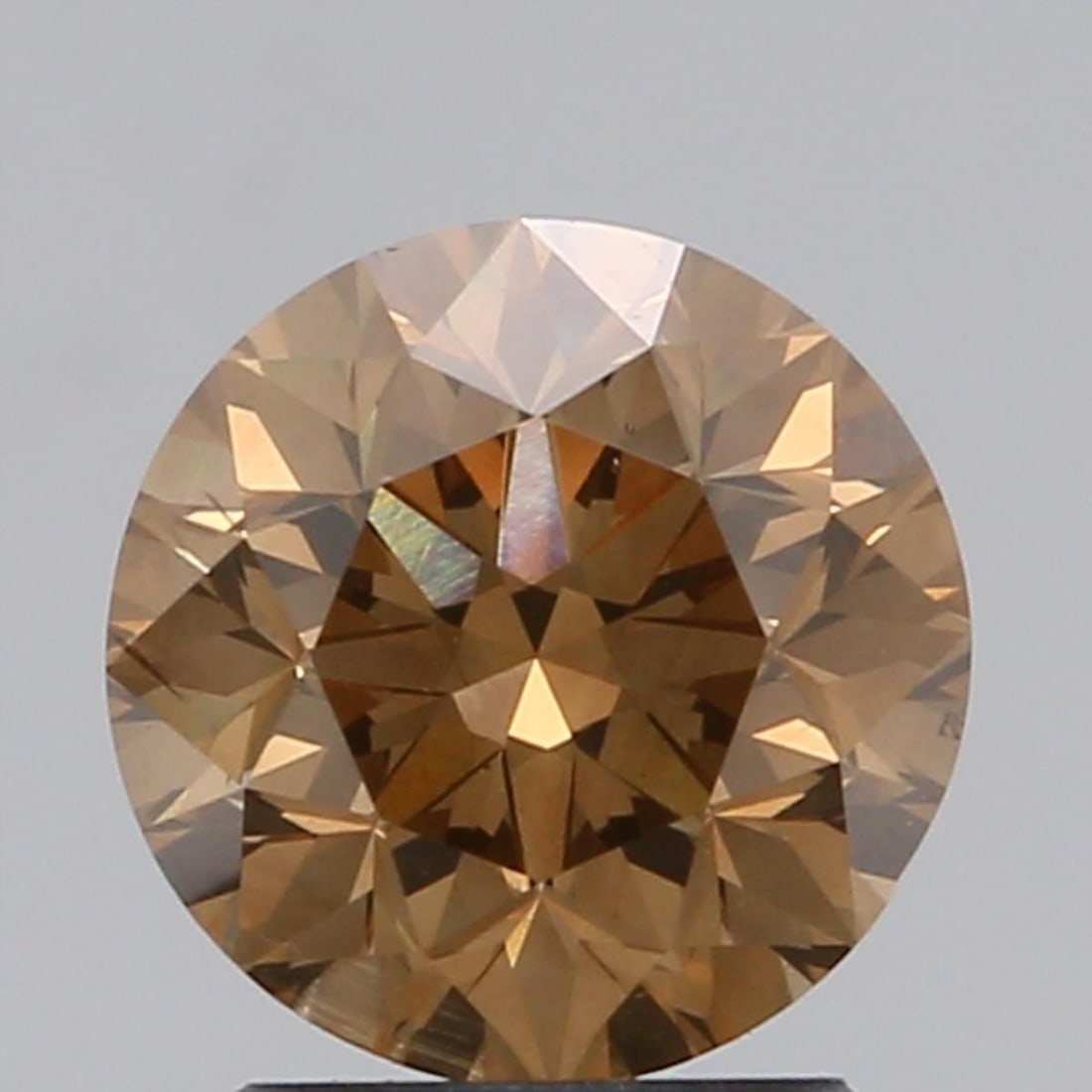 Loose Diamond - ROUND 2.05ct Fancy Deep Yellowish Brown SI1: Loose Diamond - ROUND 2.05ct Fancy Deep Yellowish Brown SI1 Source: Natural Shape: ROUND Carats: 2.05 Color: Fancy Deep Yellowish Brown Certification: IGI Video: