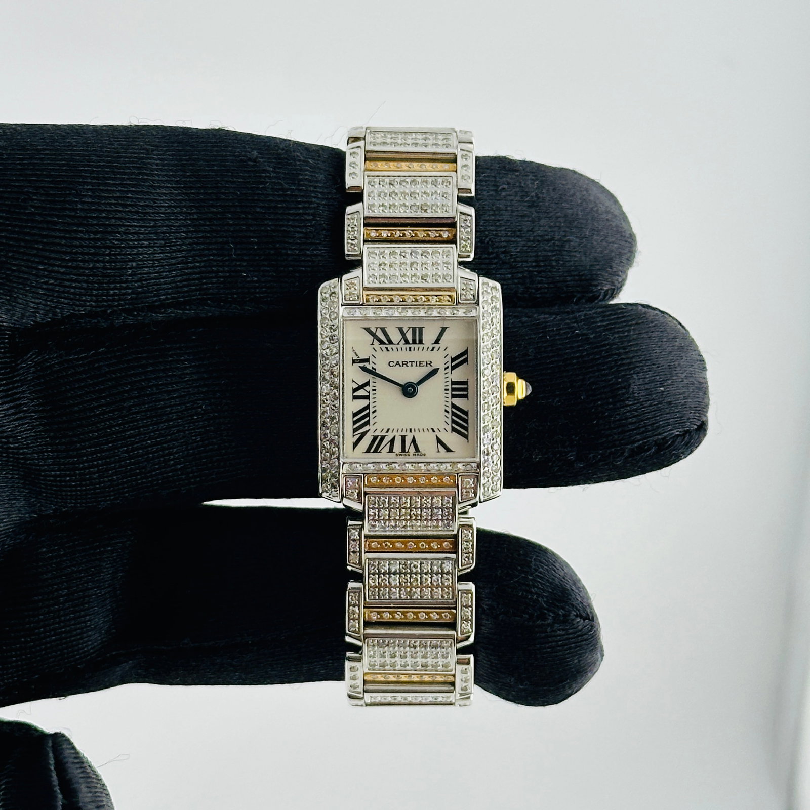 Cartier Tank Iced Out Ladies Watch Ref 2384 White Dial Diamond Bracelet: Cartier Tank Iced Out Ladies Watch Ref 2384 White Dial Diamond Bracelet This Cartier Tank Iced Out watch features a white dial, a diamond-set bezel, and a diamond bracelet. Designed for ladies, it is 