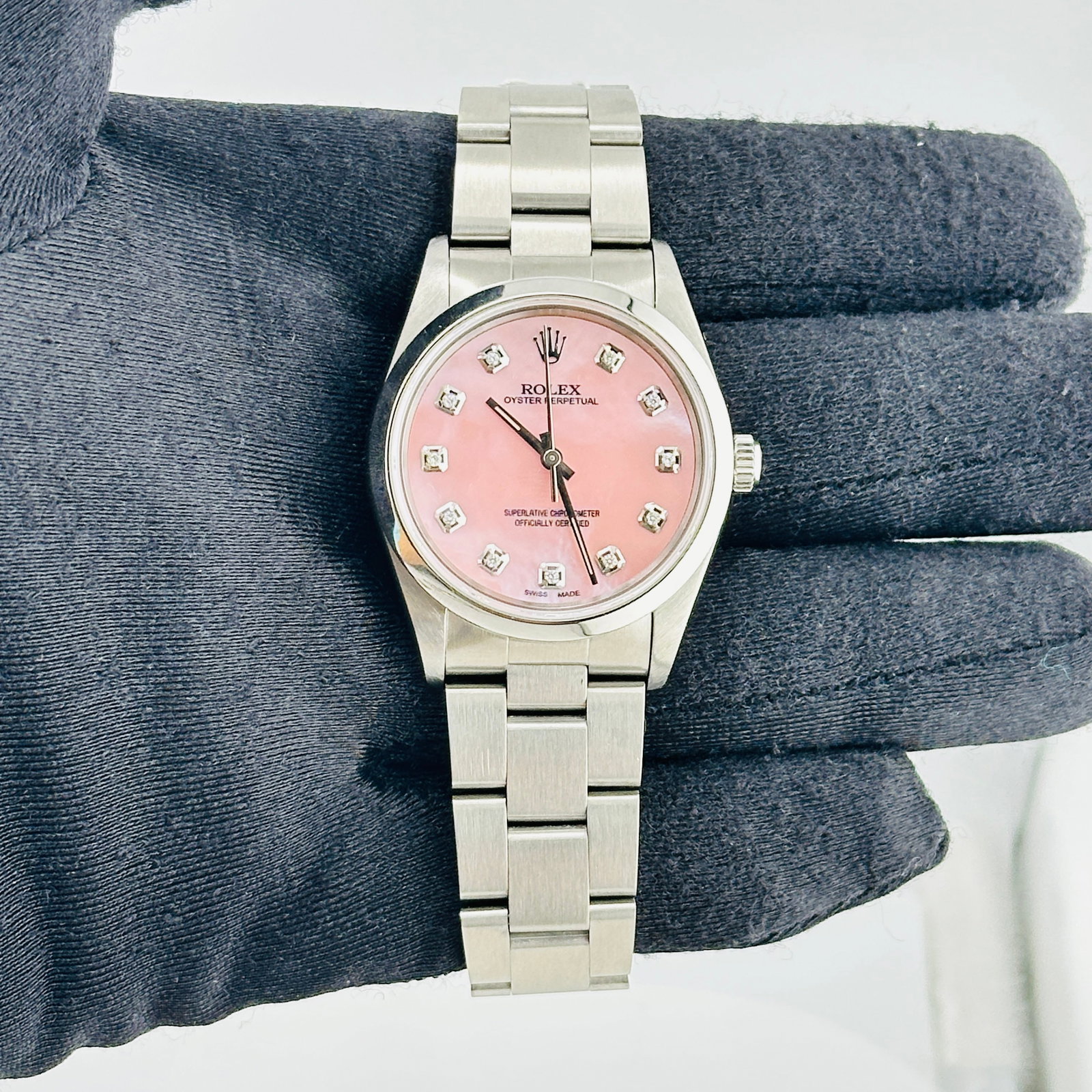 Rolex Air-King Ref. 14000 Oyster Bracelet aftermarket Pink MOP Diamond Dial: Rolex Air-King Ref. 14000 Oyster Bracelet aftermarket Pink MOP Diamond Dial Rolex Air-King reference 14000 with an Aftermarket pink MOP diamond dial, smooth bezel, and Oyster bracelet. This unisex wat