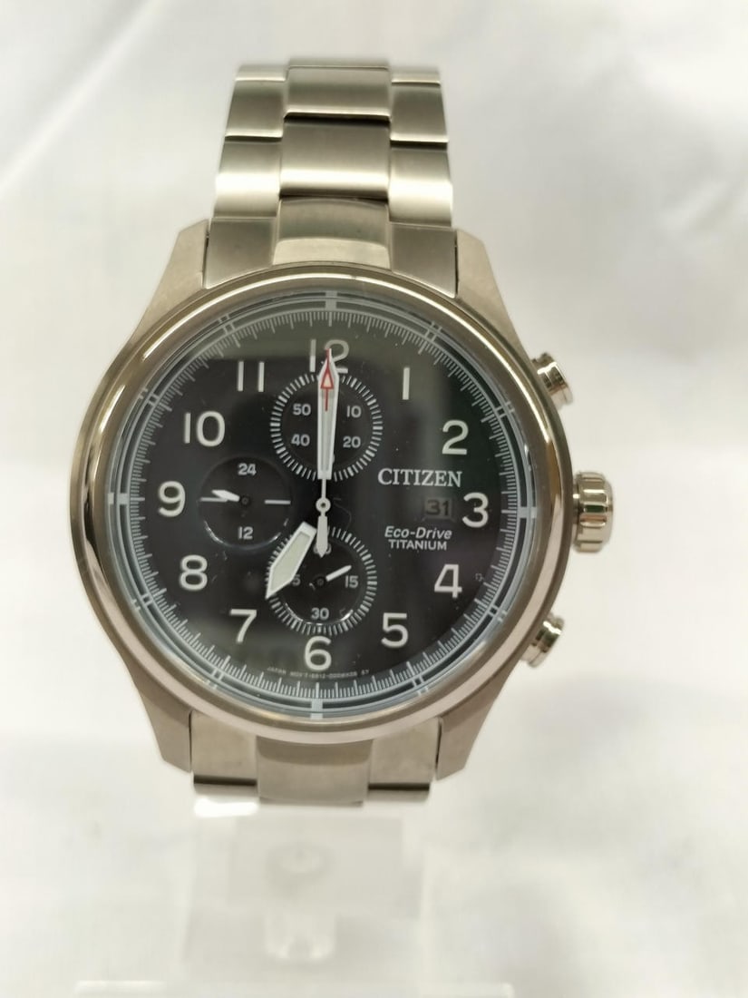 Citizen B612-001V201 mens Eco-Drive titanium chronograph watch: Citizen B612-001V201 mens Eco-Drive titanium chronograph watch Citizen Eco-Drive Super Titanium men's wristwatch, model B612-001V201. This pre-owned watch features a solar-powered radio-controlled mov