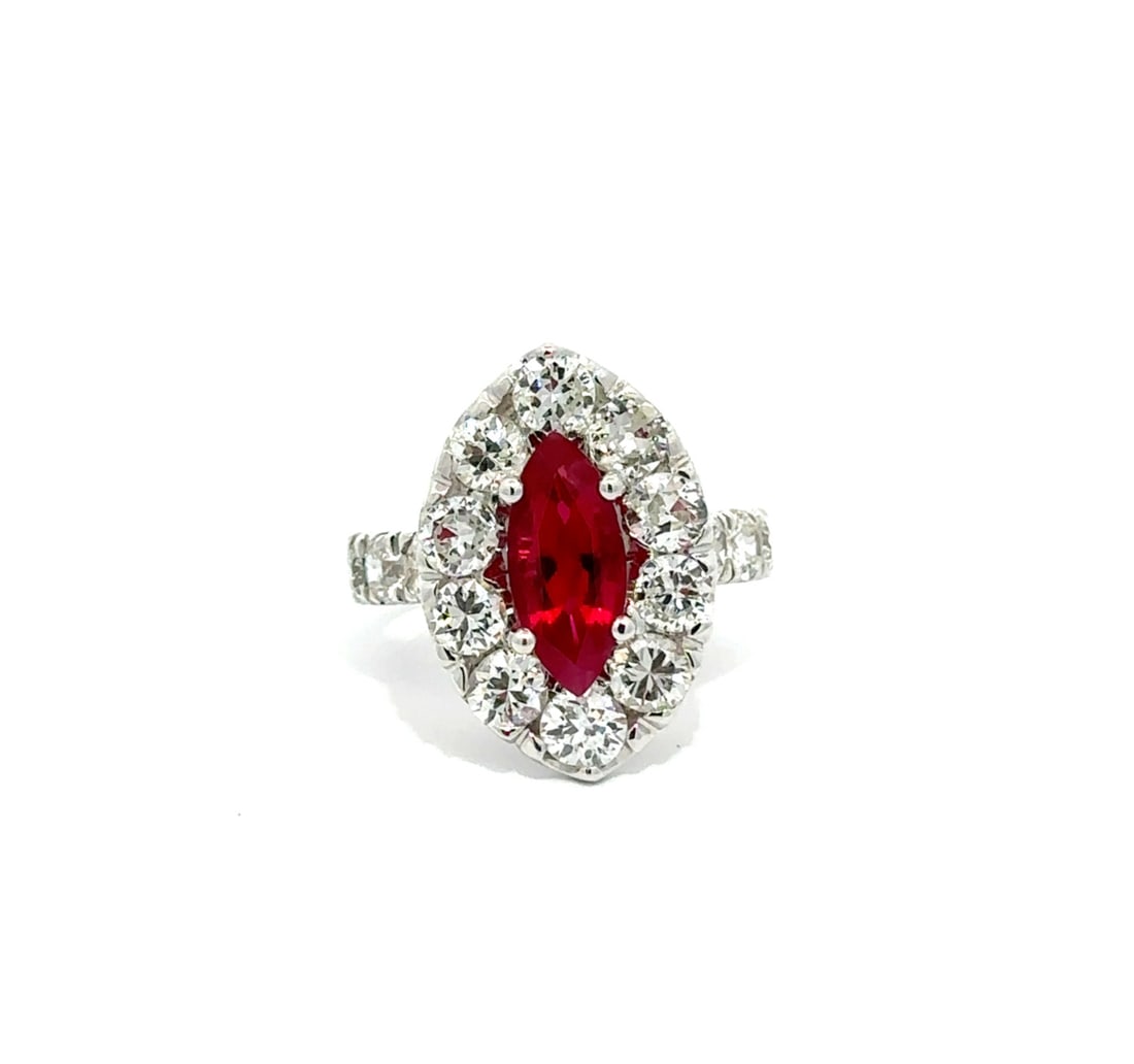 18k White Gold Vintage 2.42ct Burma Ruby Diamond Halo Ring GIA AGL Certified: 18k White Gold Vintage 2.42ct Burma Ruby Diamond Halo Ring GIA AGL Certified This stunning vintage cocktail ring showcases a remarkable 2.42ct marquise cut ruby, originating from Burma, known for its 