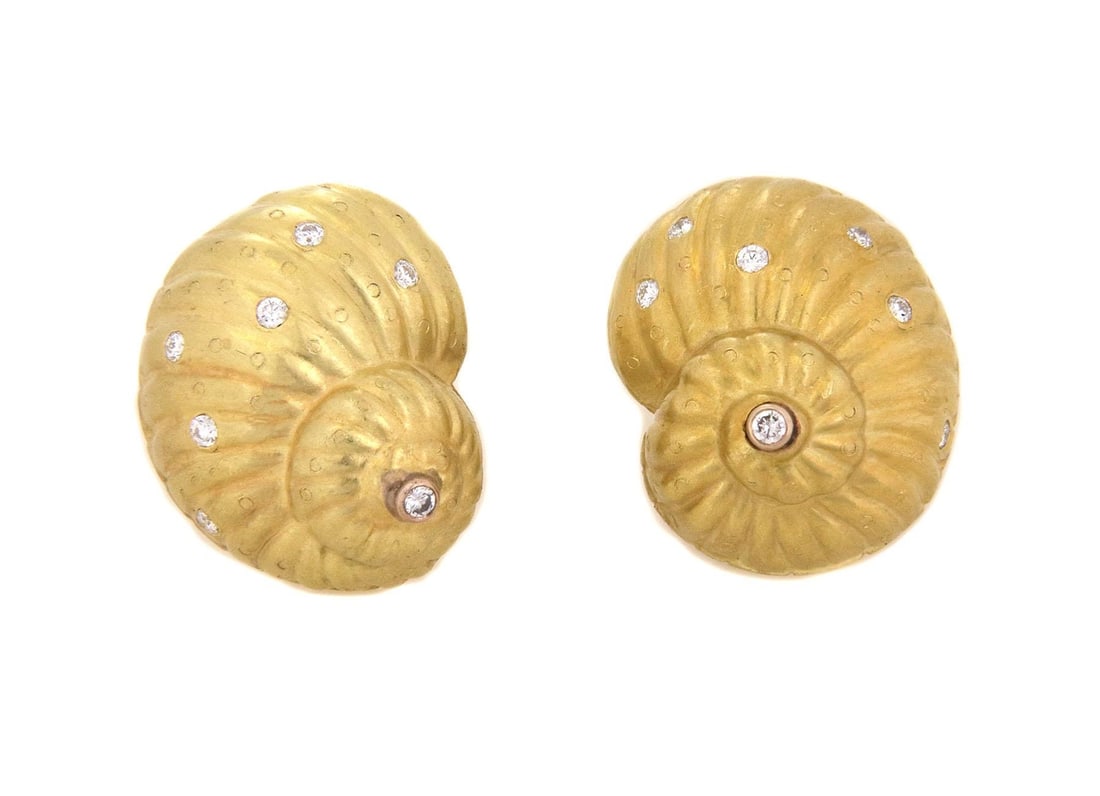 J. Boss 18k Yellow Gold Seashell Clip-On Earrings with Diamonds: J. Boss 18k Yellow Gold Seashell Clip-On Earrings with Diamonds Enhance your elegance with this exquisite pair of J. Boss Diamond Clip on Earrings, expertly crafted from 18k yellow gold. Each earring 