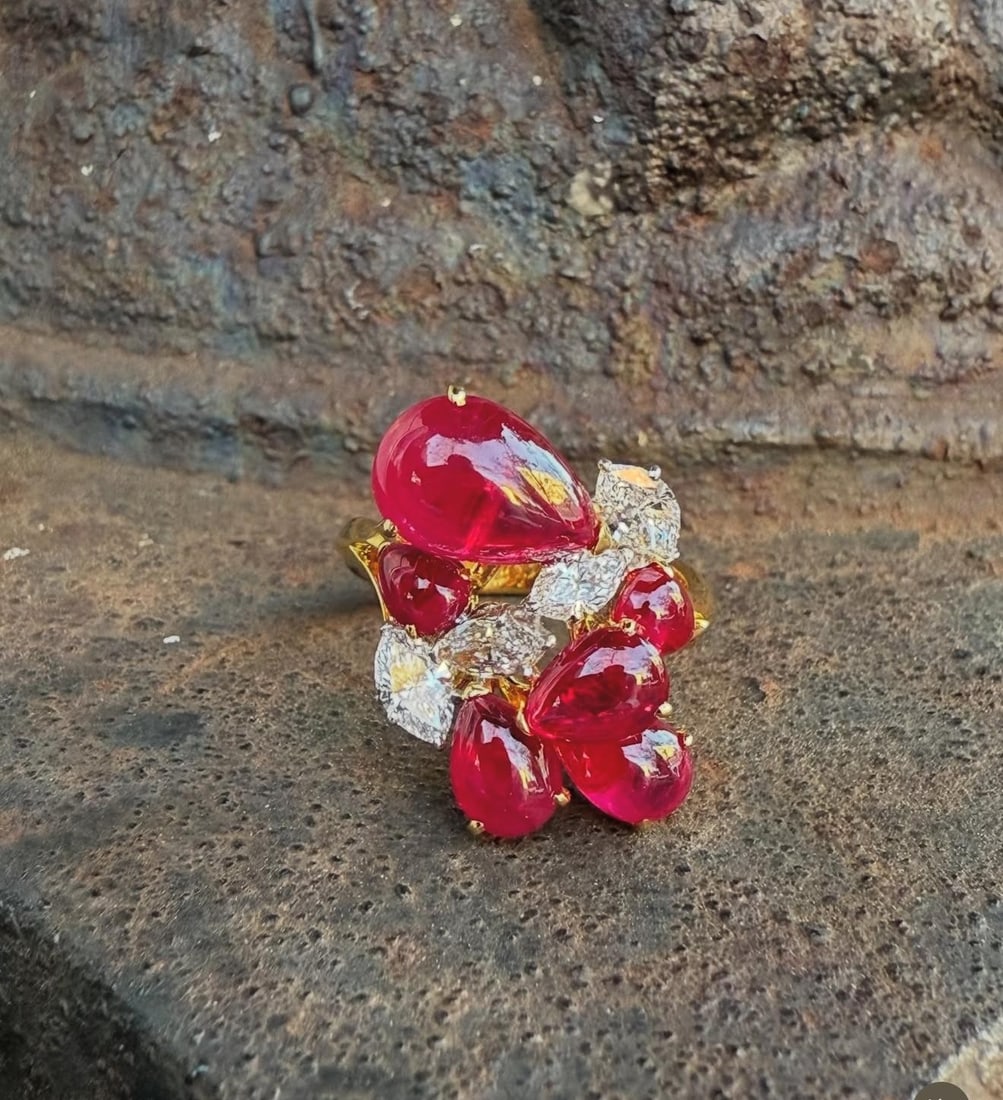 GIA Certified 18k Gold Platinum Ruby Diamond Cocktail Ring: GIA Certified 18k Gold Platinum Ruby Diamond Cocktail Ring This cocktail ring features six natural, genuine Burma rubies in a pear cabochon cut, prong set to display their exceptional vivid red color 