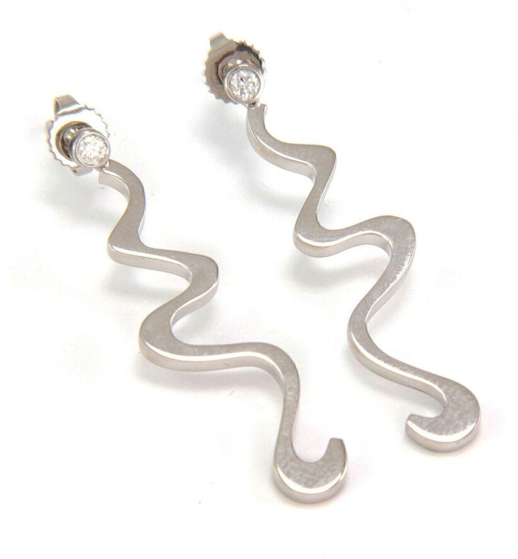 Tiffany Co Equus Long Diamond Drop Earrings 18k White Gold by Frank Gehry: Tiffany Co Equus Long Diamond Drop Earrings 18k White Gold by Frank Gehry Pre-owned Tiffany & Co. Frank Gehry Equus long earrings in 18k white gold with a sculptural dangle design from the Equus colle