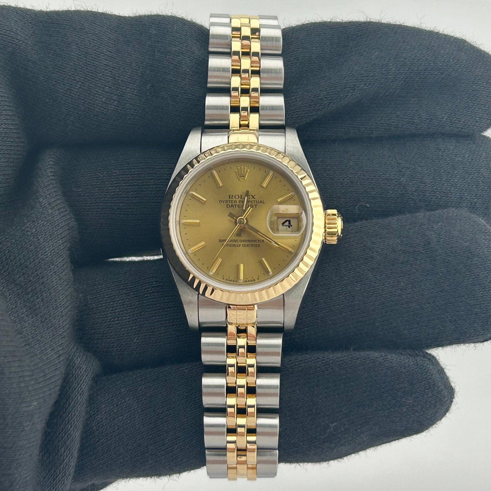 Rolex 69173 Datejust Lady Watch Champagne Dial Jubilee Bracelet: Rolex 69173 Datejust Lady Watch Champagne Dial Jubilee Bracelet Rolex Datejust Lady wristwatch featuring a champagne stick dial, fluted bezel, and D-Link Jubilee bracelet. This ladies model is identif