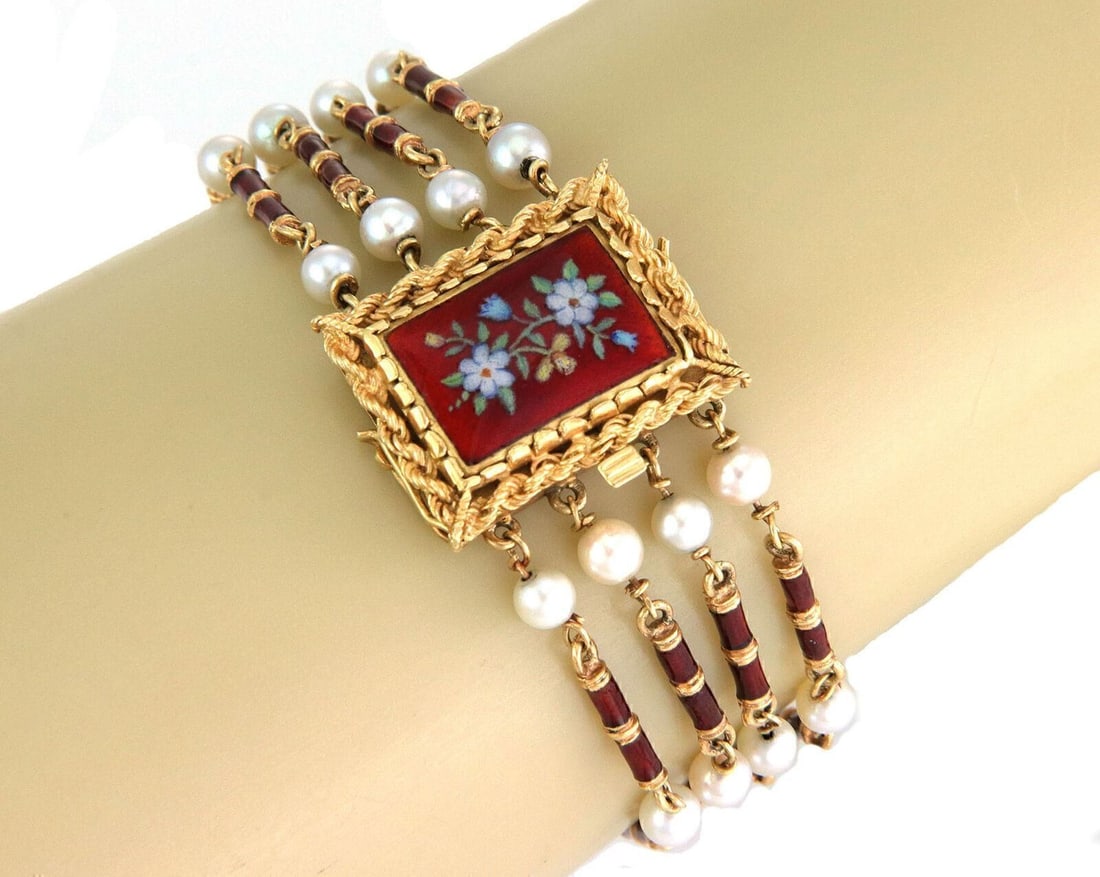 Vintage 18k Yellow Gold 4 Strand Pearl Bracelet with Enamel Floral Slide: Vintage 18k Yellow Gold 4 Strand Pearl Bracelet with Enamel Floral Slide Vintage multi-strand bracelet featuring cultured pearls and an ornate floral slide enhancer. Crafted in 18k yellow gold with en