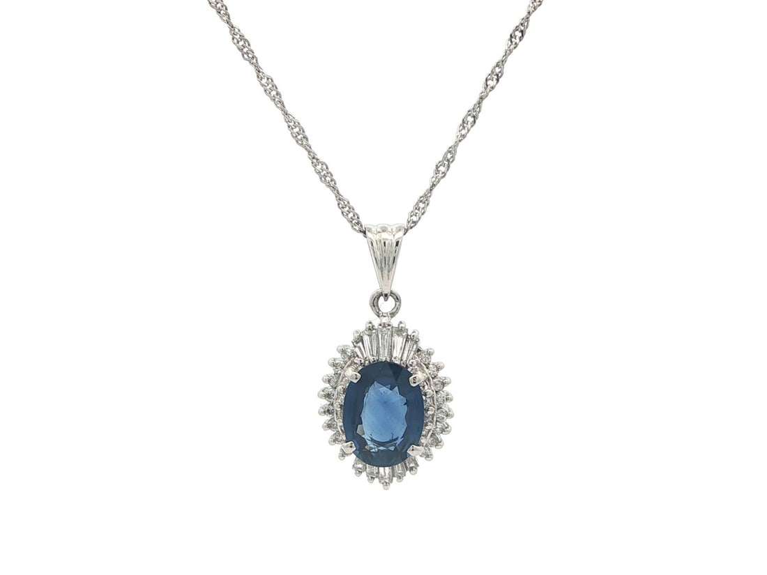 Platinum Pendant Necklace with 1.36ct Blue Sapphire and Diamond Halo Adjustable Chain: Platinum Pendant Necklace with 1.36ct Blue Sapphire and Diamond Halo Adjustable Chain This elegant necklace features a pendant crafted in solid .900 platinum with a fine rope link chain in .850 platin