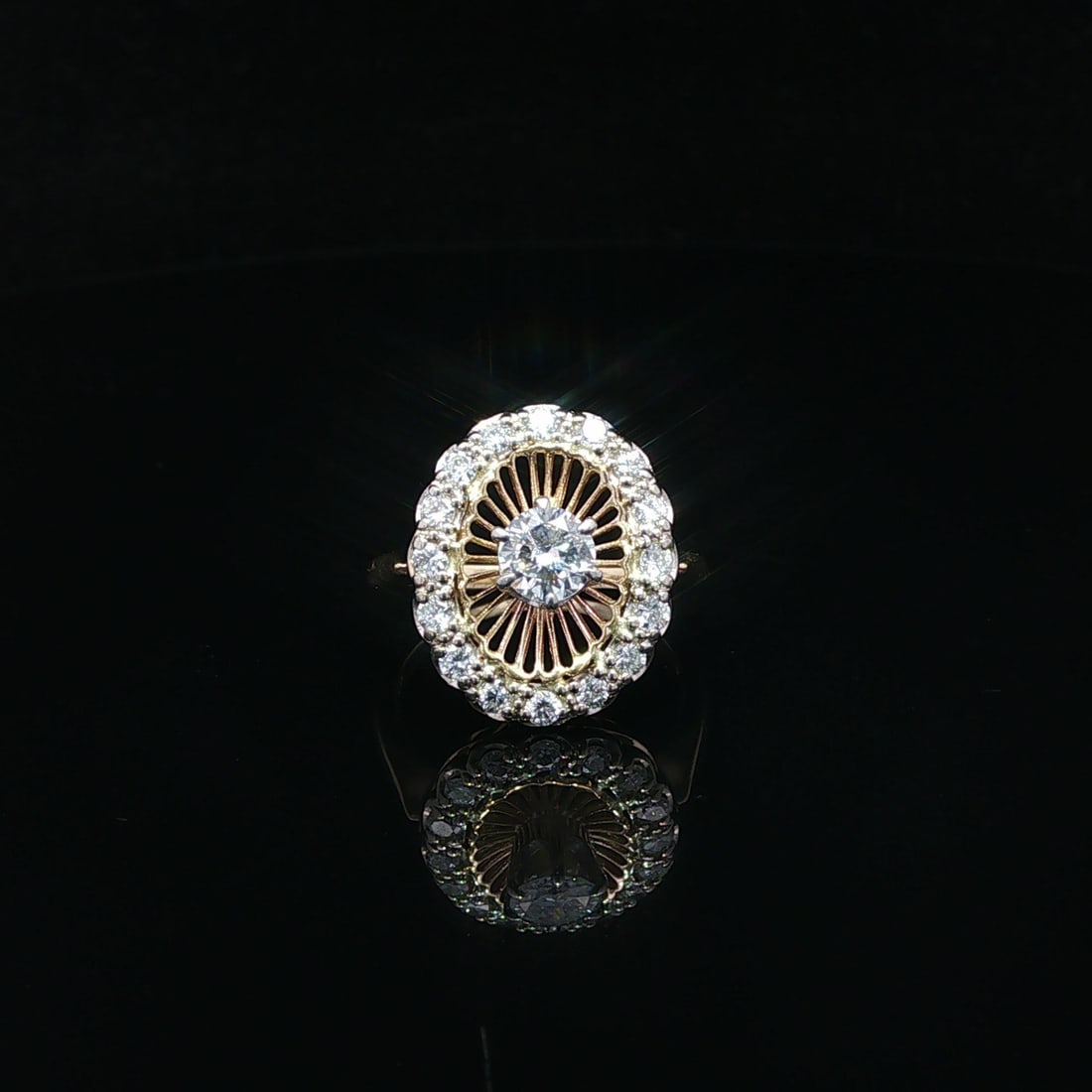 Cocktail Ring 14k Yellow and White Gold with Diamond Sunburst Filigree Halo Design: Cocktail Ring 14k Yellow and White Gold with Diamond Sunburst Filigree Halo Design This vintage cocktail ring features an elegant oval sunburst filigree halo design crafted in solid 14k yellow and whi