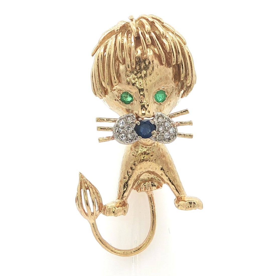 Whimsical Lion Cat Brooch in 18K Yellow Gold with Diamonds Sapphires and Emeralds: Whimsical Lion Cat Brooch in 18K Yellow Gold with Diamonds Sapphires and Emeralds This exquisite brooch features a whimsical lion design, crafted from solid 14-18K yellow gold, marked 18k. The piece i