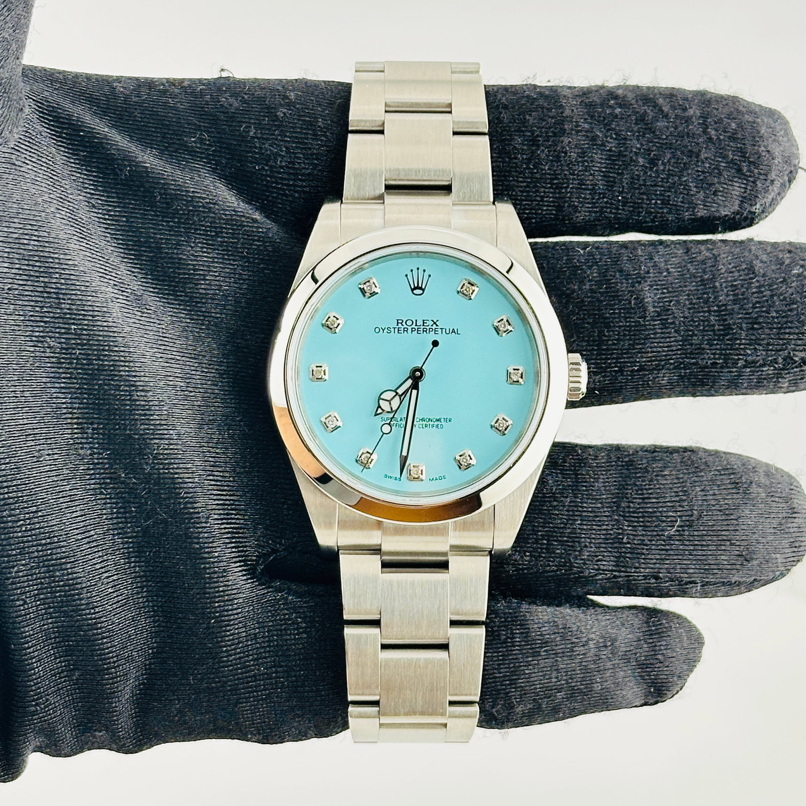 Rolex Explorer I Ref 214270 Oyster Bracelet aftermarket Tiffany diamond dial: Rolex Explorer I Ref 214270 Oyster Bracelet aftermarket Tiffany diamond dial Mens Rolex Explorer I with reference 214270. It features an Aftermarket Tiffany diamond dial, smooth bezel, and Oyster brac