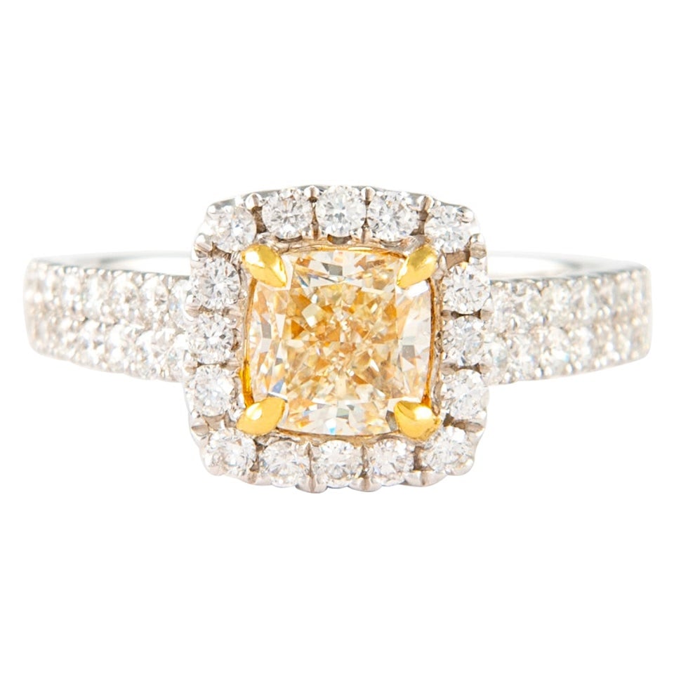 1.90ct Fancy Yellow Cushion Diamond Ring 18k Gold EGL Certified: 1.90ct Fancy Yellow Cushion Diamond Ring 18k Gold EGL Certified This exquisite 1.90ctt Fancy Yellow Cushion VS1 Diamond Ring features a stunning EGL certified cushion cut diamond with a vibrant Fancy 