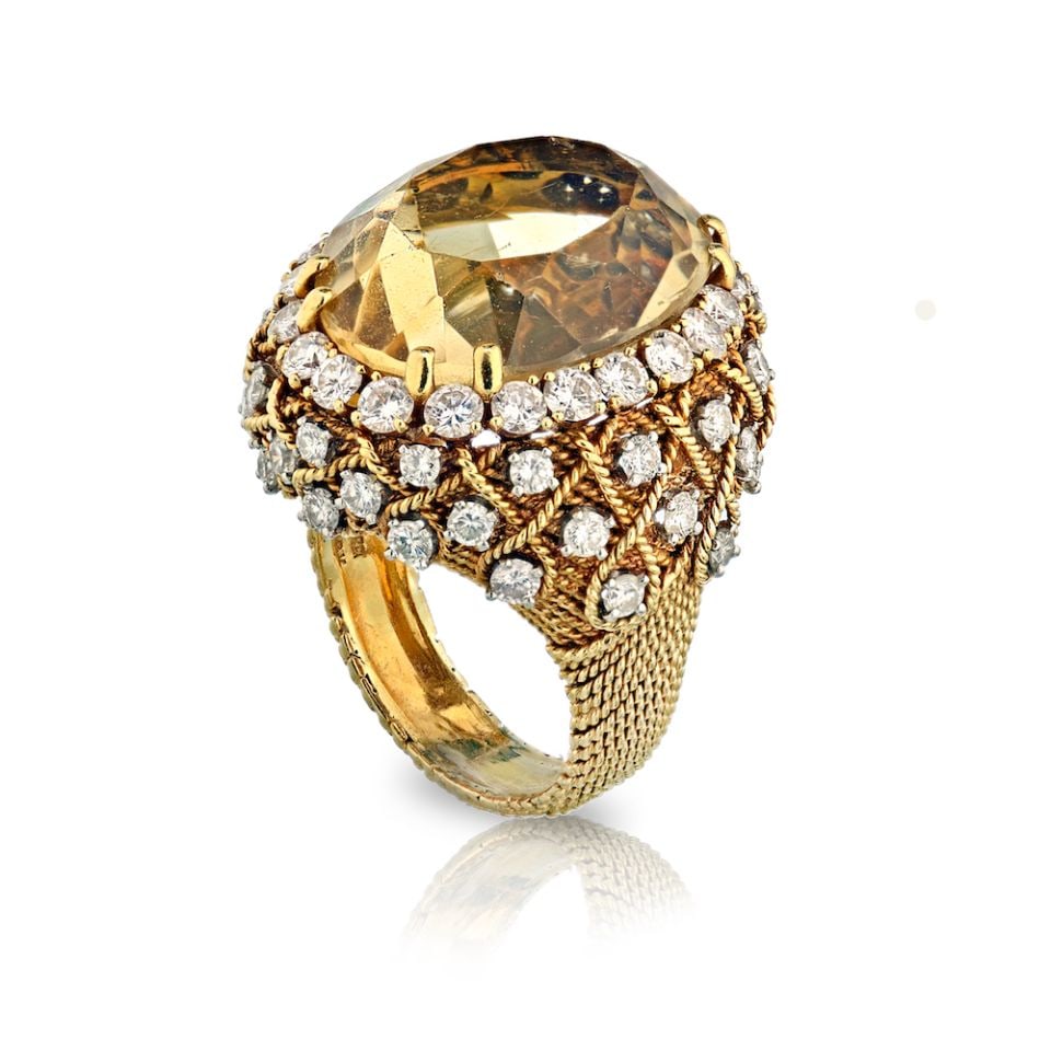David Webb 5.50 Carat Diamond Citrine Ring in Platinum & 18K Gold: David Webb 5.50 Carat Diamond Citrine Ring in Platinum & 18K Gold This exquisite estate ring features a stunning bombe design, showcasing an oval-shaped citrine at its center, elegantly framed by bril