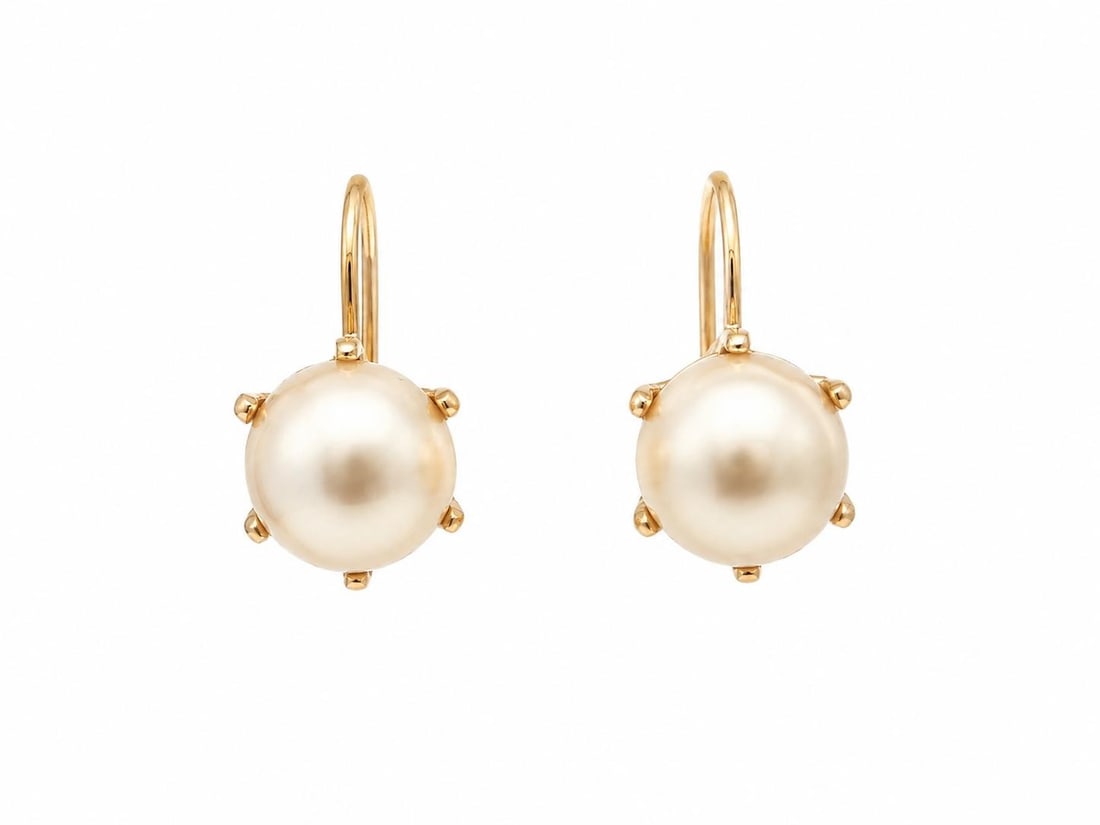 Unbranded 13-14k Yellow Gold Pearl Drop Earrings Leverback Pair: Unbranded 13-14k Yellow Gold Pearl Drop Earrings Leverback Pair Vintage pearl drop earrings in solid yellow gold with claw prong settings and lever back closures. Each earring features a genuine cultu