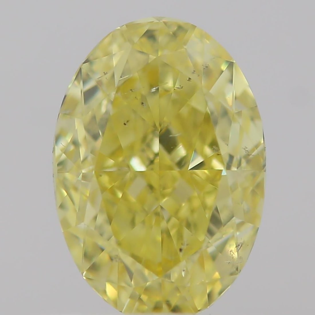 Loose Diamond - OVAL 0.7ct Fancy Intense Yellow SI2: Loose Diamond - OVAL 0.7ct Fancy Intense Yellow SI2 Source: Natural Shape: OVAL Carats: 0.7 Color: Fancy Intense Yellow Certification: GIA Video:
