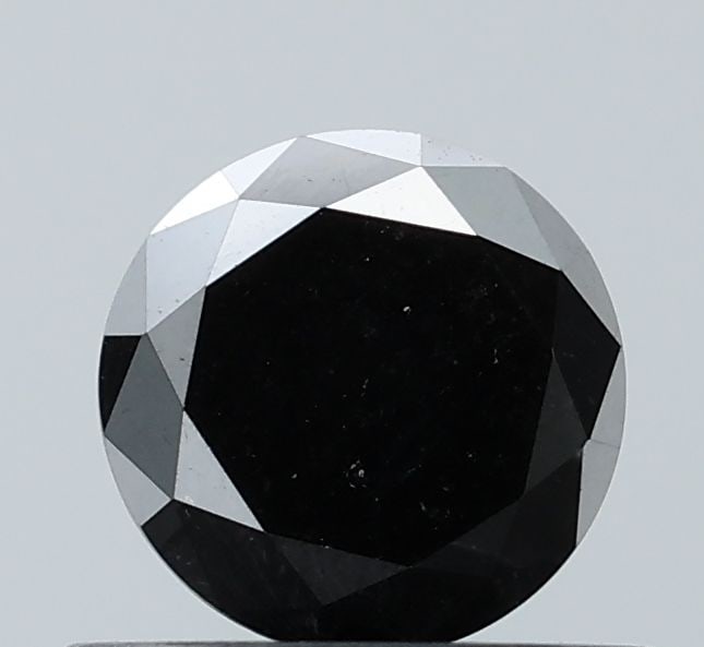 Loose Diamond - ROUND 0.61ct Fancy Black VVS2: Loose Diamond - ROUND 0.61ct Fancy Black VVS2 Source: Natural Shape: ROUND Carats: 0.61 Color: Fancy Black Certification: NONE Video: