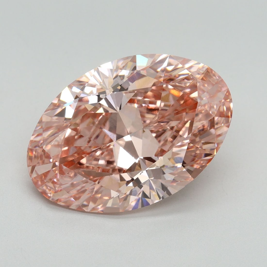 Loose Diamond - OVAL 10.19ct Fancy Vivid Pink VVS2: Loose Diamond - OVAL 10.19ct Fancy Vivid Pink VVS2 Source: This is a real non-mined Diamond that has been grown in a lab Shape: OVAL Carats: 10.19 Color: Fancy Vivid Pink Certification: IGI Video: