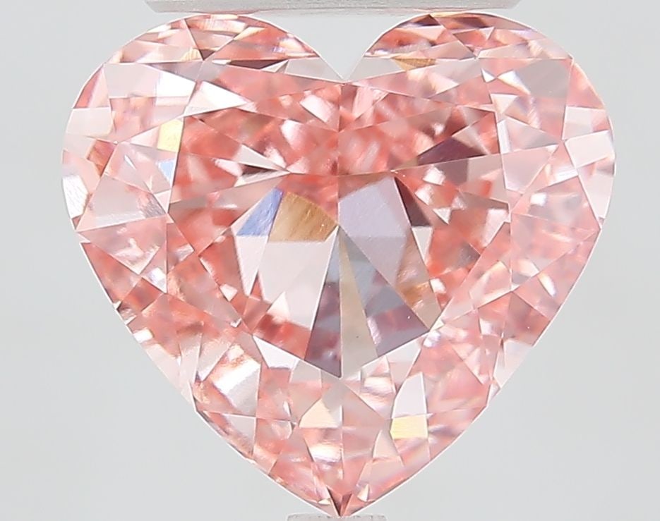 Loose Diamond - HEART 6.02ct Fancy Vivid Pink VVS2: Loose Diamond - HEART 6.02ct Fancy Vivid Pink VVS2 Source: This is a real non-mined Diamond that has been grown in a lab Shape: HEART Carats: 6.02 Color: Fancy Vivid Pink Certification: IGI Video: