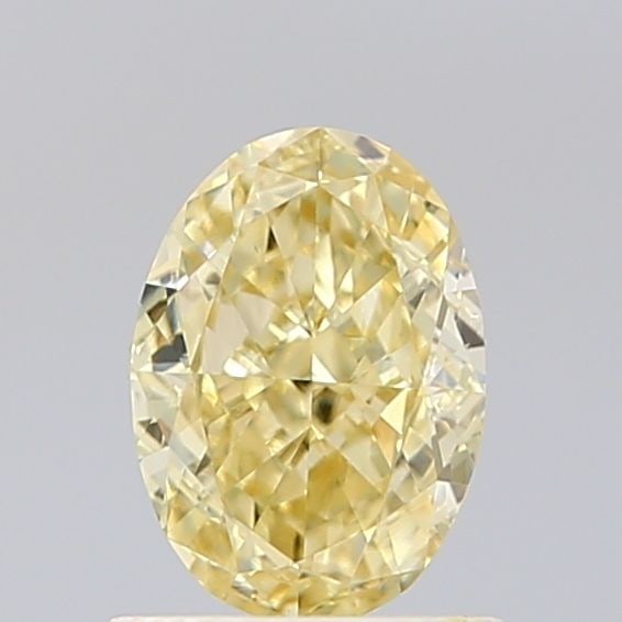 Loose Diamond - OVAL 0.86ct Fancy Yellow VVS2: Loose Diamond - OVAL 0.86ct Fancy Yellow VVS2 Source: This is a real non-mined Diamond that has been grown in a lab Shape: OVAL Carats: 0.86 Color: Fancy Yellow Certification: IGI Video: