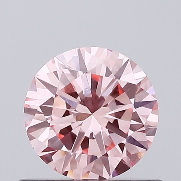 Loose Diamond - ROUND 0.58ct Fancy Vivid Pink VVS2: Loose Diamond - ROUND 0.58ct Fancy Vivid Pink VVS2 Source: This is a real non-mined Diamond that has been grown in a lab Shape: ROUND Carats: 0.58 Color: Fancy Vivid Pink Certification: IGI Video: