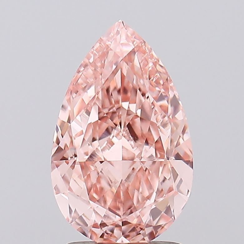 Loose Diamond - PEAR 2.18ct Fancy Vivid Pink VVS2: Loose Diamond - PEAR 2.18ct Fancy Vivid Pink VVS2 Source: This is a real non-mined Diamond that has been grown in a lab Shape: PEAR Carats: 2.18 Color: Fancy Vivid Pink Certification: IGI Video: