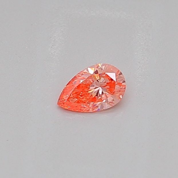 Loose Diamond - PEAR 0.19ct Fancy Vivid Orangey Pink VS1: Loose Diamond - PEAR 0.19ct Fancy Vivid Orangey Pink VS1 Source: This is a real non-mined Diamond that has been grown in a lab Shape: PEAR Carats: 0.19 Color: Fancy Vivid Orangey Pink Certification: I
