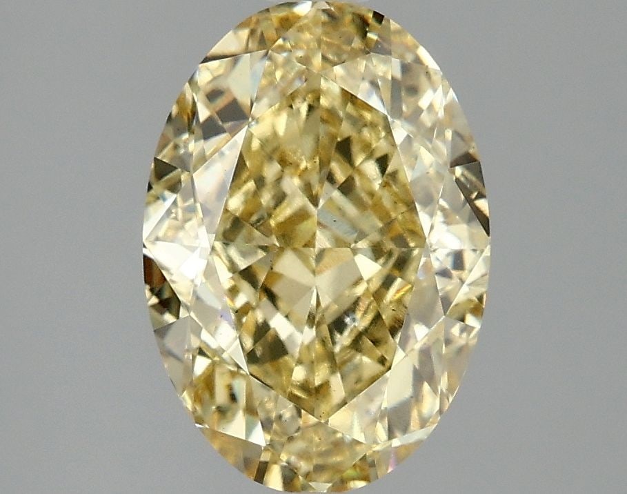 Loose Diamond - OVAL 3.1ct Fancy Intense Yellow VS2: Loose Diamond - OVAL 3.1ct Fancy Intense Yellow VS2 Source: This is a real non-mined Diamond that has been grown in a lab Shape: OVAL Carats: 3.1 Color: Fancy Intense Yellow Certification: IGI Video: