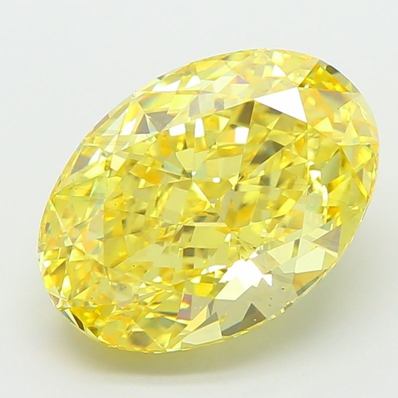 Loose Diamond - OVAL 5.04ct Fancy Vivid Yellow VS2: Loose Diamond - OVAL 5.04ct Fancy Vivid Yellow VS2 Source: This is a real non-mined Diamond that has been grown in a lab Shape: OVAL Carats: 5.04 Color: Fancy Vivid Yellow Certification: IGI Video: