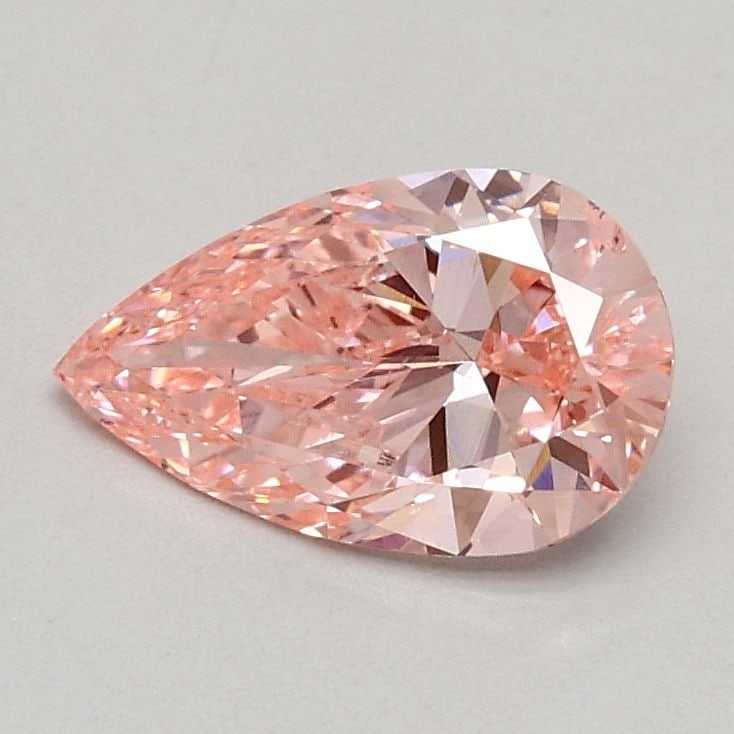 Loose Diamond - PEAR 0.6ct Fancy Vivid Pink VS2: Loose Diamond - PEAR 0.6ct Fancy Vivid Pink VS2 Source: This is a real non-mined Diamond that has been grown in a lab Shape: PEAR Carats: 0.6 Color: Fancy Vivid Pink Certification: IGI Video:
