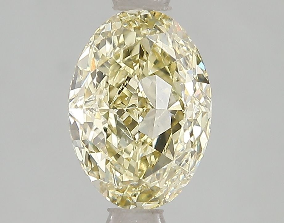 Loose Diamond - OVAL 2.01ct Fancy Intense Yellow VS2: Loose Diamond - OVAL 2.01ct Fancy Intense Yellow VS2 Source: This is a real non-mined Diamond that has been grown in a lab Shape: OVAL Carats: 2.01 Color: Fancy Intense Yellow Certification: IGI Video