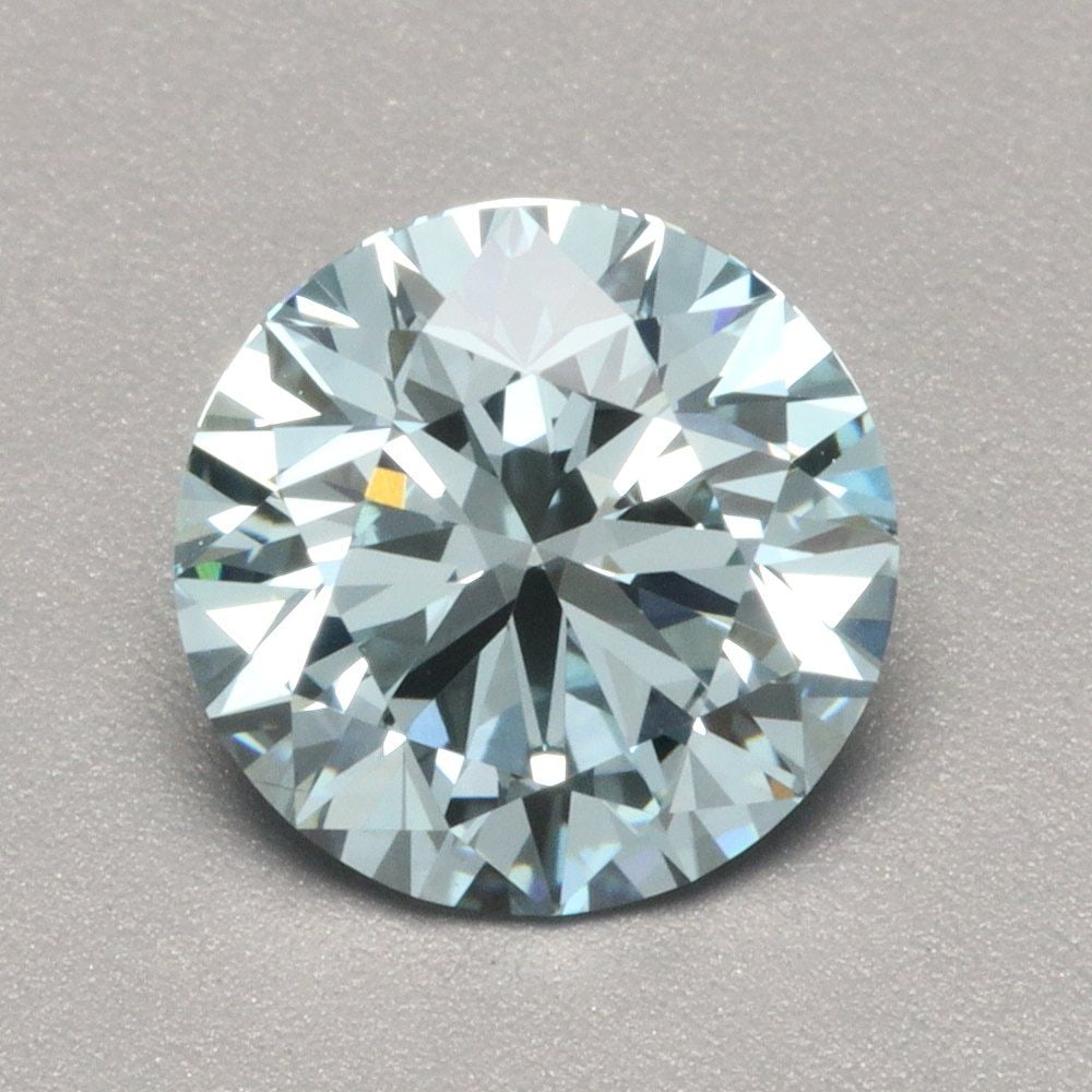 Ideal Loose Diamond - ROUND 1.23ct Fancy Vivid Blue VS1: Ideal Loose Diamond - ROUND 1.23ct Fancy Vivid Blue VS1 Source: This is a real non-mined Diamond that has been grown in a lab Shape: ROUND Carats: 1.23 Color: Fancy Vivid Blue Certification: IGI