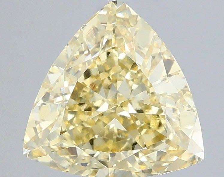 Loose Diamond - TRIANGULAR 2.55ct Fancy Yellow VVS2: Loose Diamond - TRIANGULAR 2.55ct Fancy Yellow VVS2 Source: This is a real non-mined Diamond that has been grown in a lab Shape: TRIANGULAR Carats: 2.55 Color: Fancy Yellow Certification: IGI Video: