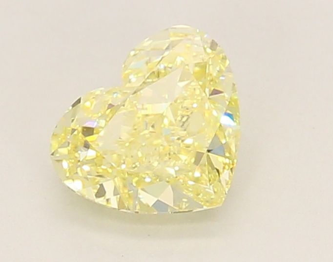 Loose Diamond - HEART 1.01ct Fancy Yellow VVS2: Loose Diamond - HEART 1.01ct Fancy Yellow VVS2 Source: This is a real non-mined Diamond that has been grown in a lab Shape: HEART Carats: 1.01 Color: Fancy Yellow Certification: IGI Video: