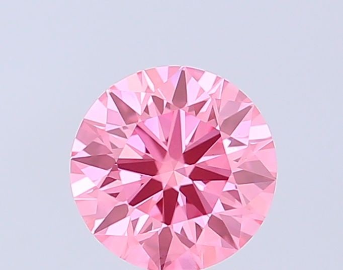 Ideal Loose Diamond - ROUND 0.82ct Fancy Vivid Pink VS1: Ideal Loose Diamond - ROUND 0.82ct Fancy Vivid Pink VS1 Source: This is a real non-mined Diamond that has been grown in a lab Shape: ROUND Carats: 0.82 Color: Fancy Vivid Pink Certification: IGI Video