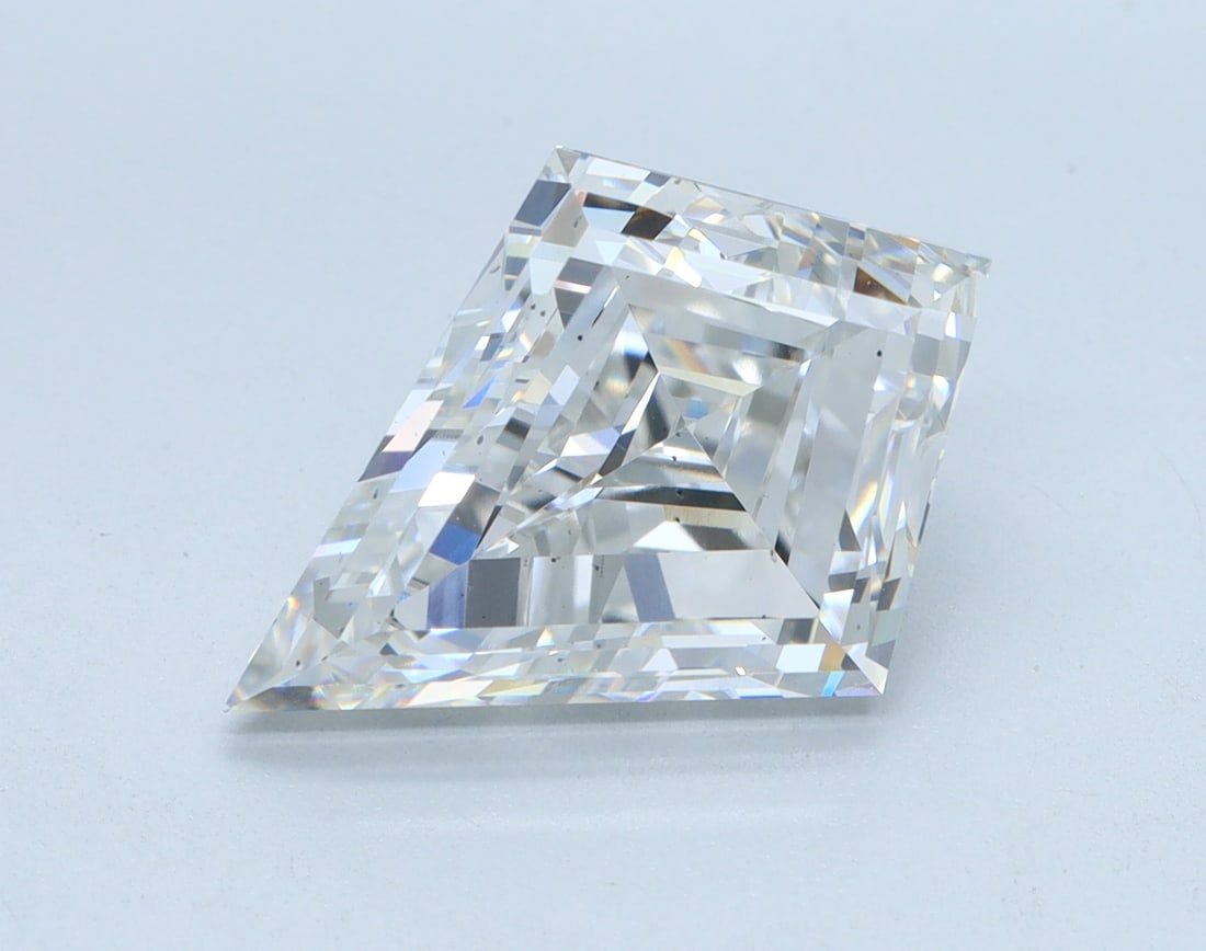 Loose Diamond - KITE STEP CUT 4.04ct E VS2: Loose Diamond - KITE STEP CUT 4.04ct E VS2 Source: This is a real non-mined Diamond that has been grown in a lab Shape: KITE STEP CUT Carats: 4.04 Color: E Clarity: VS2 Certification: IGI Condition: P