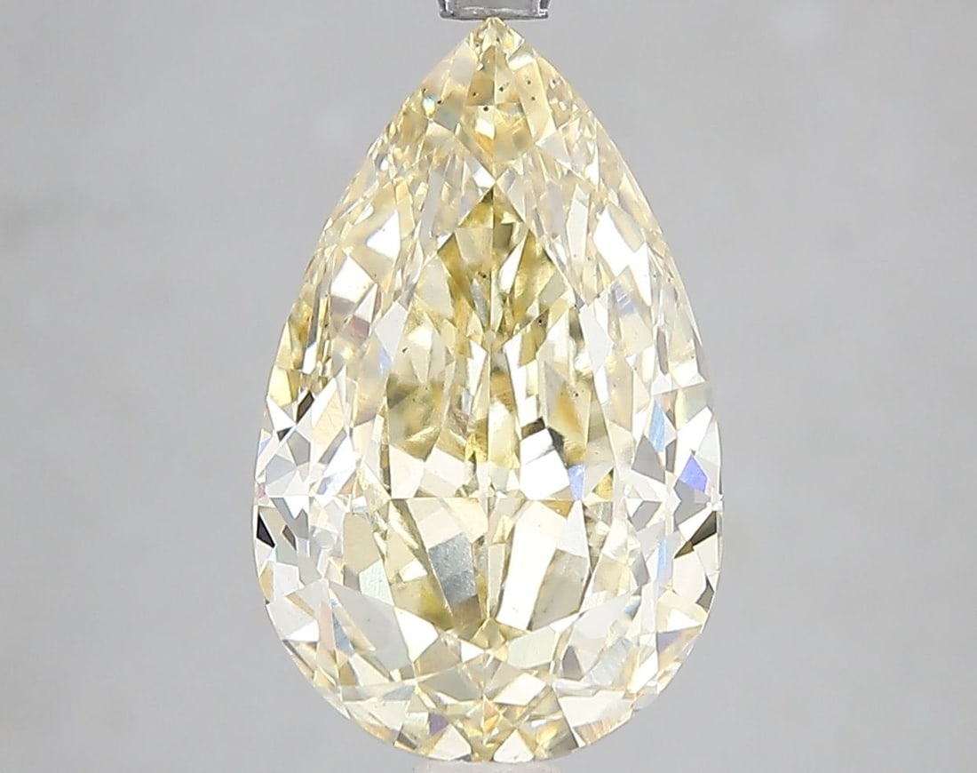 Loose Diamond - PEAR 4.79ct Fancy Intense Yellow SI1: Loose Diamond - PEAR 4.79ct Fancy Intense Yellow SI1 Source: This is a real non-mined Diamond that has been grown in a lab Shape: PEAR Carats: 4.79 Color: Fancy Intense Yellow Certification: IGI Video