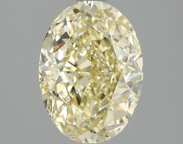 Loose Diamond - OVAL 2.07ct Fancy Yellow VS1: Loose Diamond - OVAL 2.07ct Fancy Yellow VS1 Source: This is a real non-mined Diamond that has been grown in a lab Shape: OVAL Carats: 2.07 Color: Fancy Yellow Certification: IGI Video: