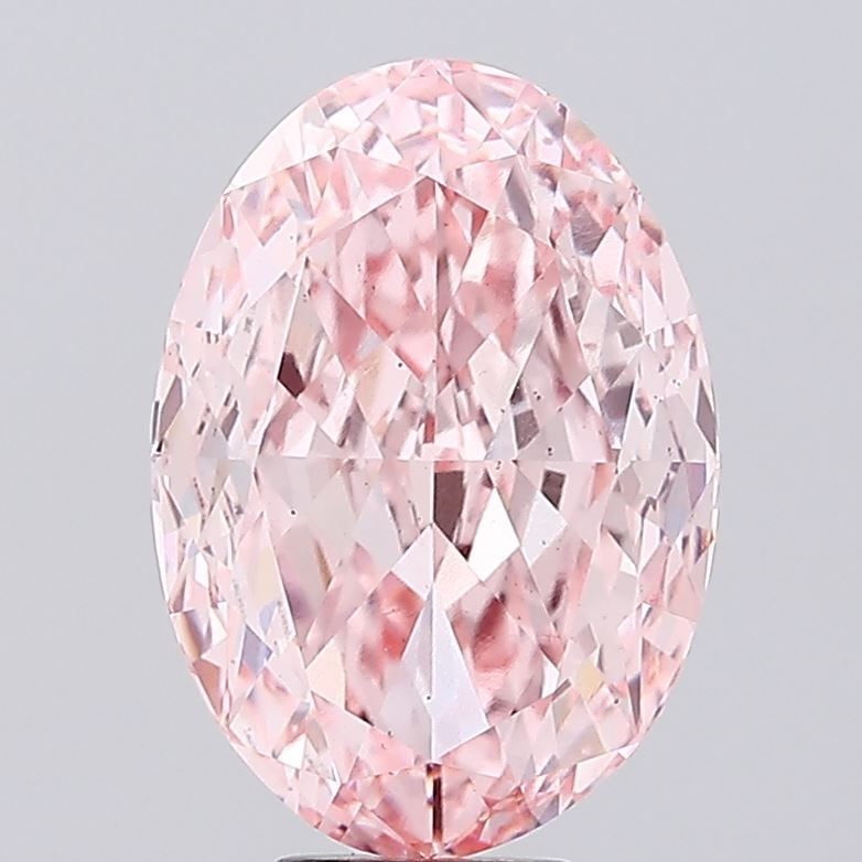 Loose Diamond - OVAL 11.04ct Fancy Vivid Pink VS2: Loose Diamond - OVAL 11.04ct Fancy Vivid Pink VS2 Source: This is a real non-mined Diamond that has been grown in a lab Shape: OVAL Carats: 11.04 Color: Fancy Vivid Pink Certification: IGI Video: