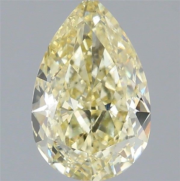 Loose Diamond - PEAR 2.0ct Fancy Yellow VS2: Loose Diamond - PEAR 2.0ct Fancy Yellow VS2 Source: This is a real non-mined Diamond that has been grown in a lab Shape: PEAR Carats: 2.0 Color: Fancy Yellow Certification: IGI Video: