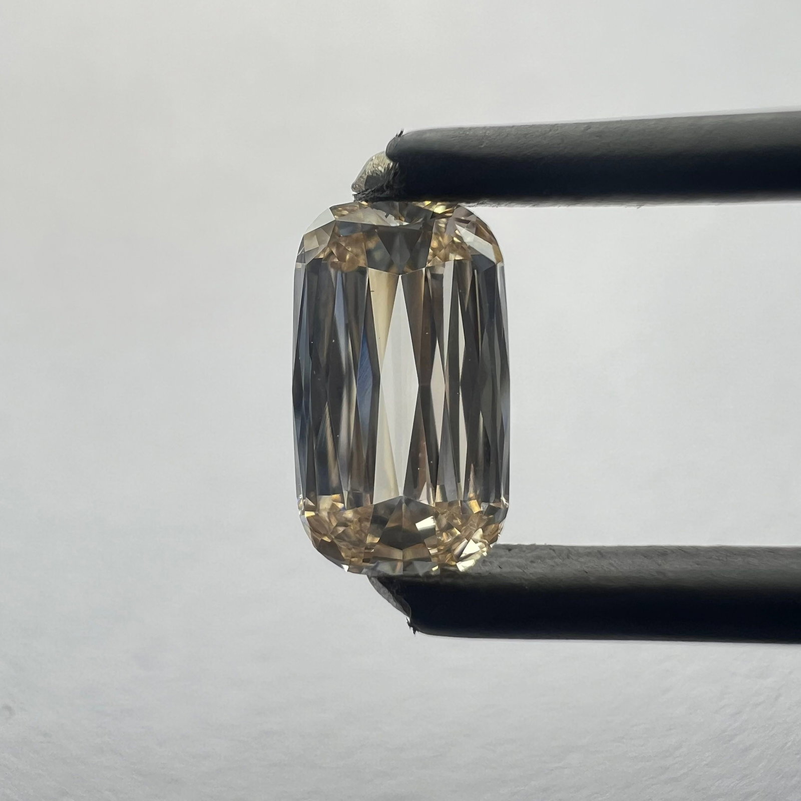 Loose Diamond - OTHER 0.73ct Champagne VS1: Loose Diamond - OTHER 0.73ct Champagne VS1 Source: This is a real non-mined Diamond that has been grown in a lab Shape: OTHER Carats: 0.73 Color: Champagne Certification: NONE PLEASE NOTE: Framed, Lar