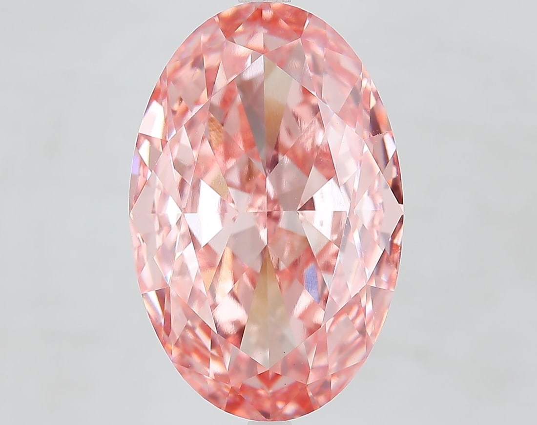 Loose Diamond - OVAL 12.09ct Fancy Vivid Pink VVS2: Loose Diamond - OVAL 12.09ct Fancy Vivid Pink VVS2 Source: This is a real non-mined Diamond that has been grown in a lab Shape: OVAL Carats: 12.09 Color: Fancy Vivid Pink Certification: IGI Video: