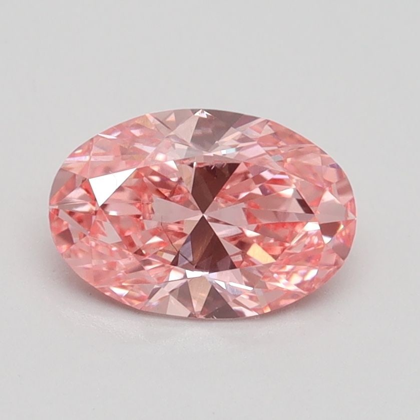 Loose Diamond - OVAL 1.05ct Fancy Vivid Pink SI1: Loose Diamond - OVAL 1.05ct Fancy Vivid Pink SI1 Source: This is a real non-mined Diamond that has been grown in a lab Shape: OVAL Carats: 1.05 Color: Fancy Vivid Pink Certification: IGI Video: