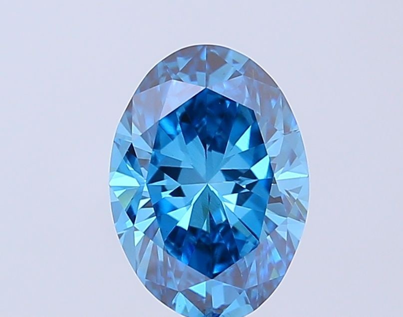 Loose Diamond - OVAL 2.03ct Fancy Vivid Blue VVS2: Loose Diamond - OVAL 2.03ct Fancy Vivid Blue VVS2 Source: This is a real non-mined Diamond that has been grown in a lab Shape: OVAL Carats: 2.03 Color: Fancy Vivid Blue Certification: IGI Video: