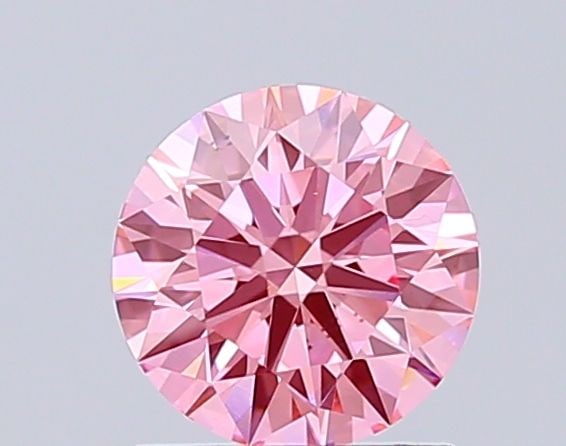 Loose Diamond - ROUND 1.02ct Fancy Vivid Pink VS1: Loose Diamond - ROUND 1.02ct Fancy Vivid Pink VS1 Source: This is a real non-mined Diamond that has been grown in a lab Shape: ROUND Carats: 1.02 Color: Fancy Vivid Pink Certification: IGI Video: